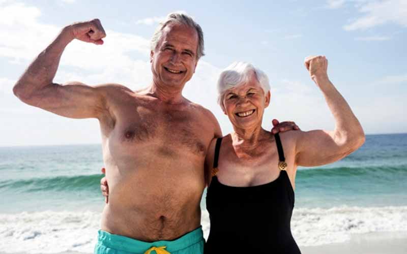 "man and woman showing strength training"