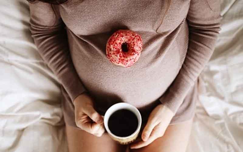 daily moderate caffeine intake during pregnancy may lead to smaller birth size