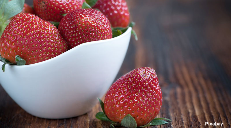 alt= "strawberry in a white bowl"