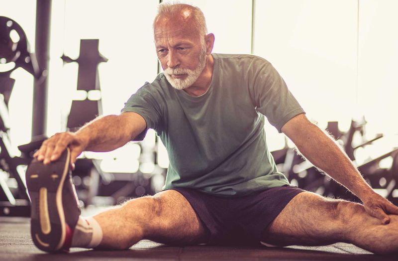 alt="old man exercising"