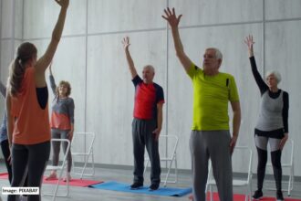 alt="older adults in HIIT exercise session"