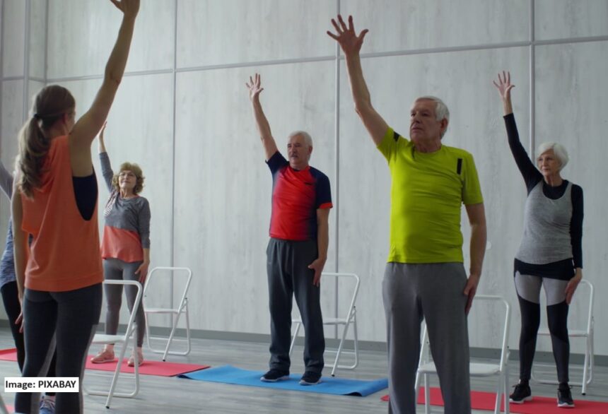 alt="older adults in HIIT exercise session"