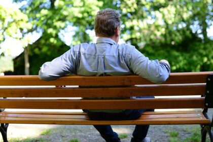 alt="diabetes patient sitting on a bench"