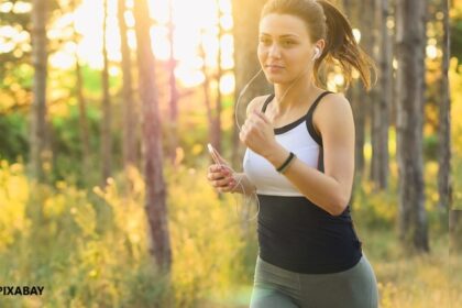 alt="woman jogging exercise"