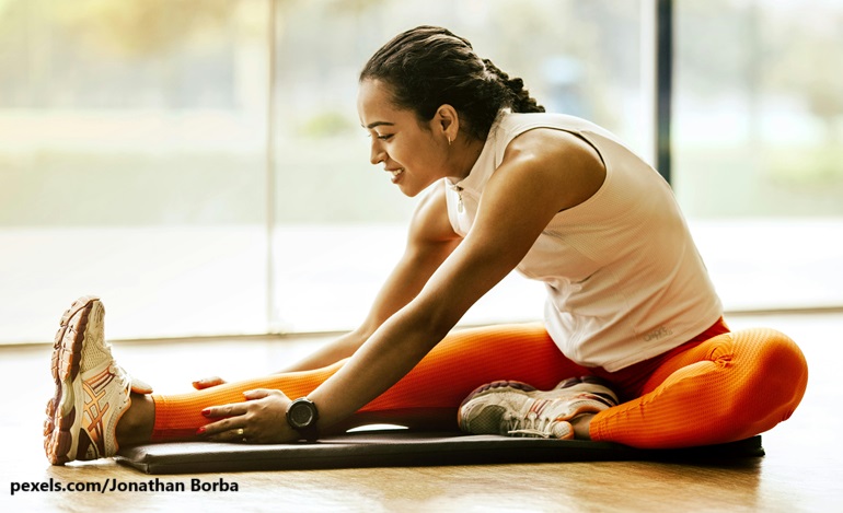 alt="Woman doing exercise"